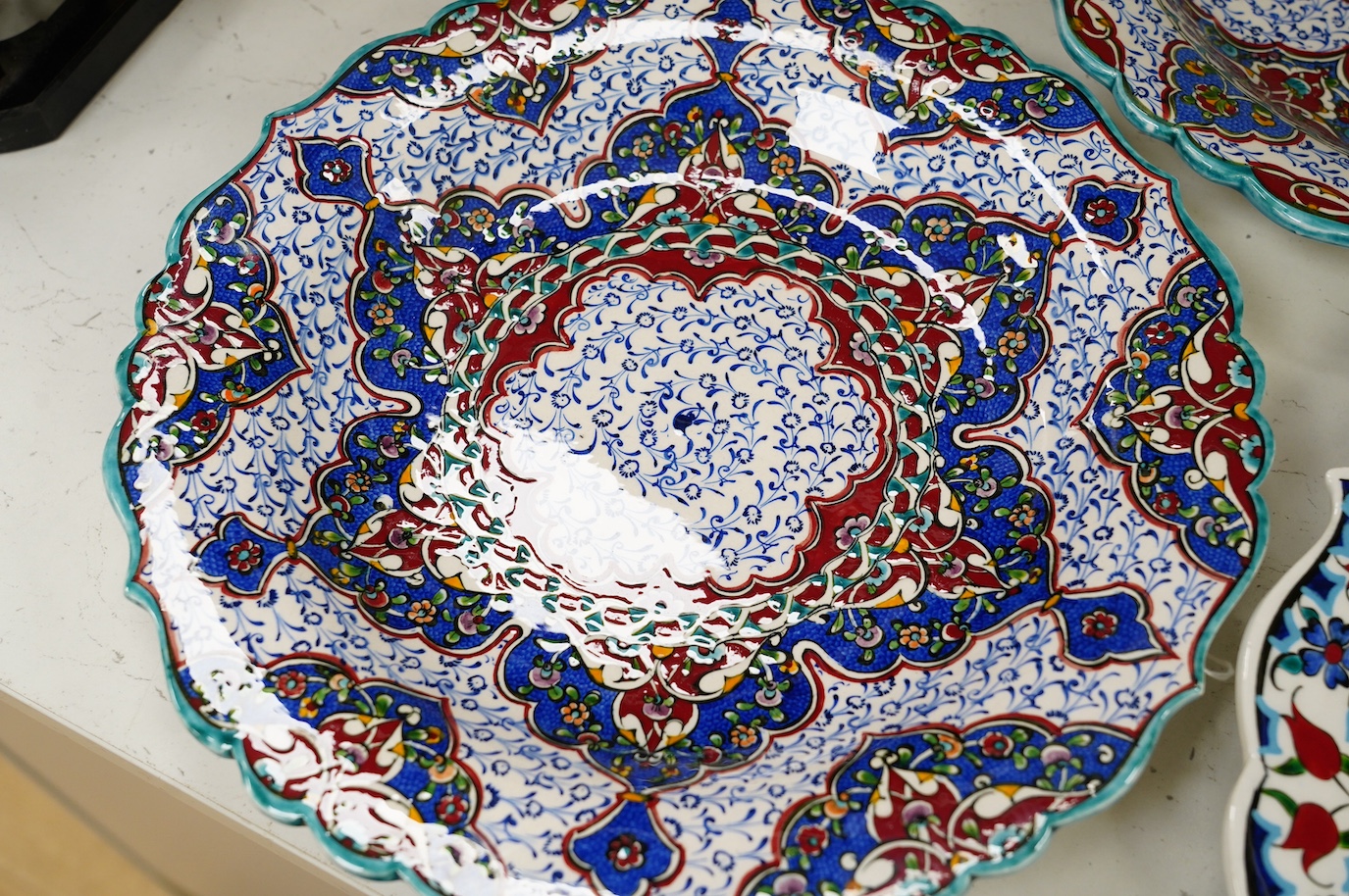 Three Kutahya Turkey pottery dishes, 30cm diameter. Condition - good